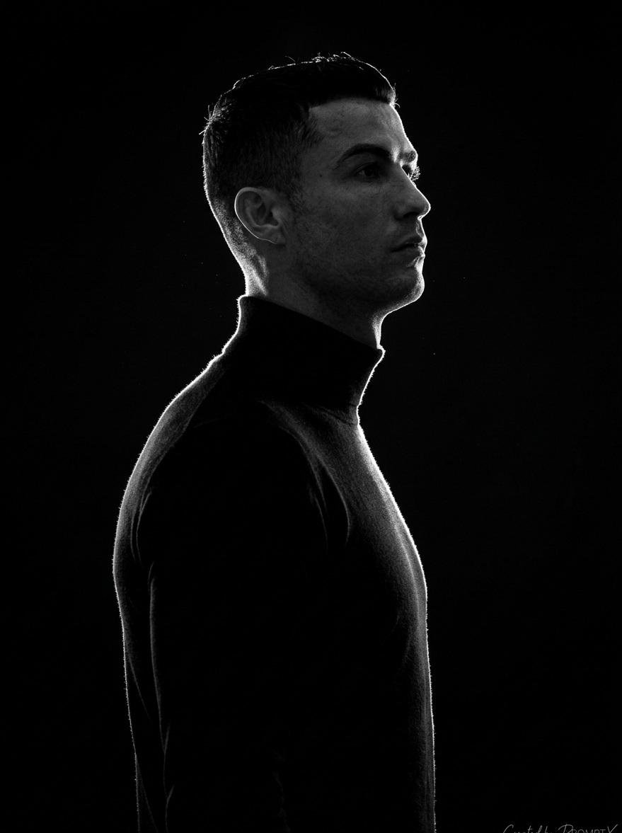 A stark, high-contrast, black-and-white (monochromatic) side