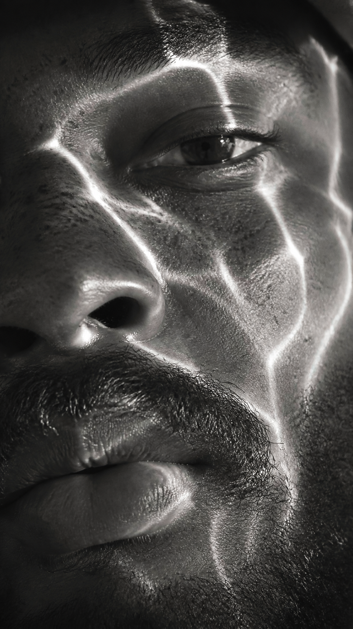 A hyperrealistic 8K black and white extreme close-up portrai