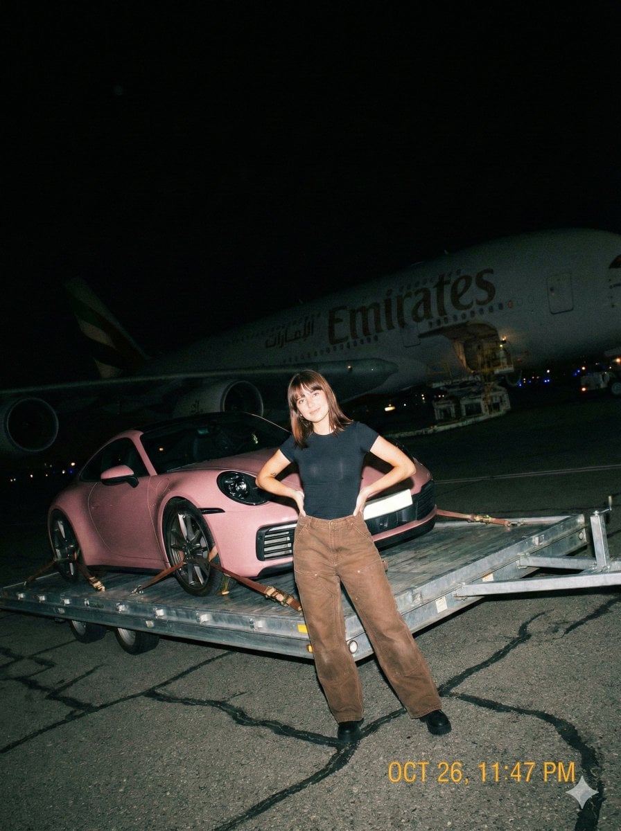 A gritty, handheld iPhone photo taken at night on an airport