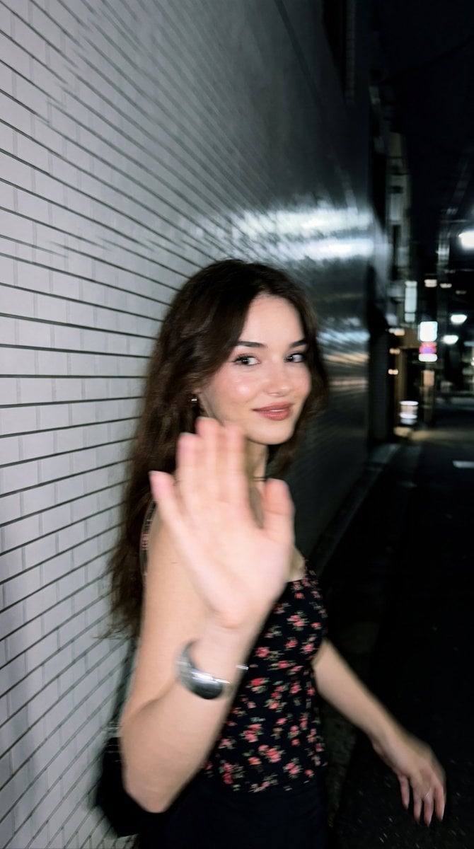 Ultra-realistic candid smartphone photograph, 9:16 vertical.